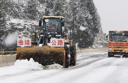 抗冰雪 保暢通云南曲靖公路局 橙 心守護春運回家路